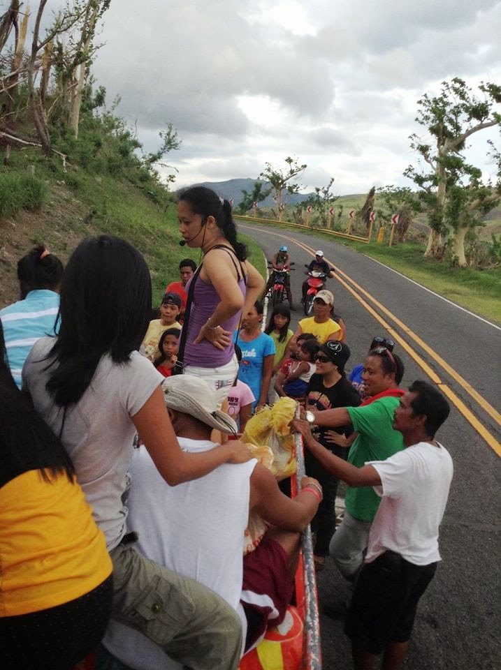 Sharon Fe Pfleider distributing aid in the Philippines.