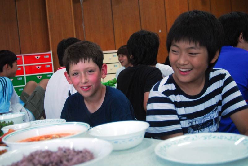 While the food was a bit spicy for Adam...after a full day of bouncing around with the students, he was ready to eat the arm off a rag doll.