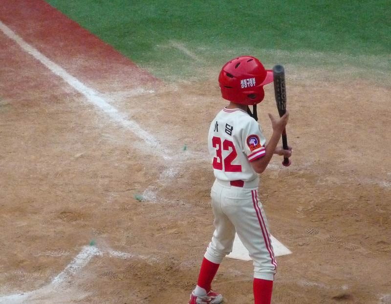 Third Pitch: What’s this? Adam is going to bunt? He is waiving the bat at the pitcher to taunt him...this is unscripted by the Coach, who, is now yelling at Adam... “Ball!!!” The catcher’s mitt cracks...that was close... Fourth pitch: “Ball!” Adam is still alive...