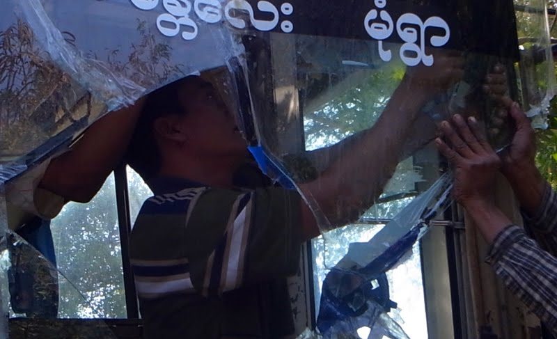 Well, eventually the bus commander realized that holding the windshield in place was futile. That is, after 6 hours of two men frantically pushing at the plate glass window with an old frayed pillow as we sped down the highway. So, they pried the windshield out at the nearest rest stop and we drove the rest of the way to Mandalay without a wind sheild.