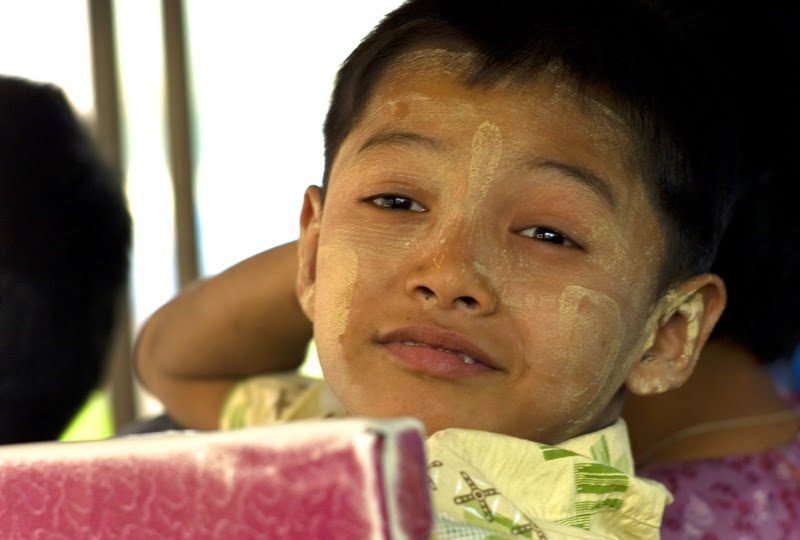 Once I got over my fear of flying glass, I started noticing that everywhere, people had painted their faces with a very light brown cosmetic. I guess it is called thanakha. <---Click the link if you want to learn more...