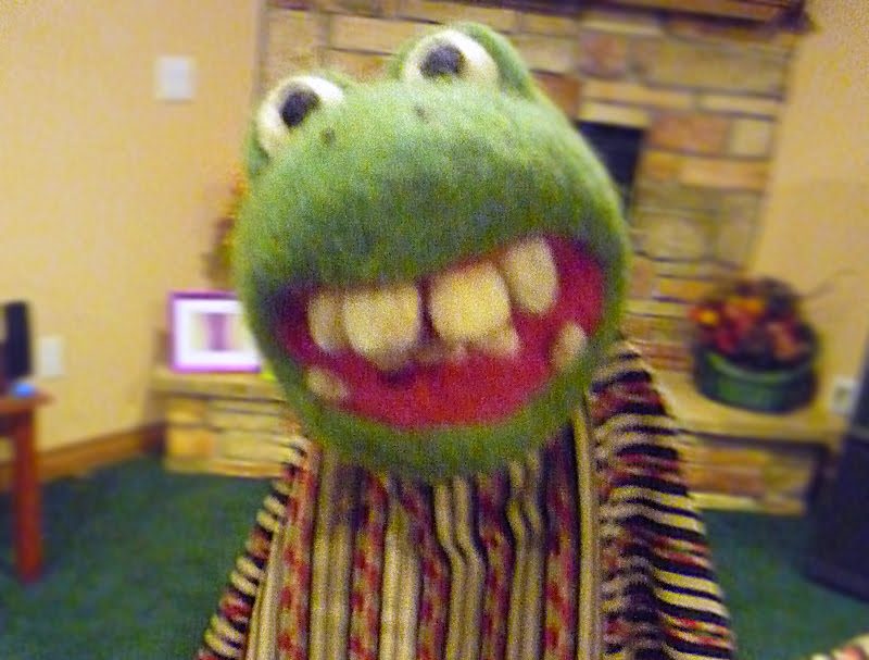 Alex doesn’t have a name for him yet...Here he is with a cape...She put arms on him later...but I don’t have a photo of that.