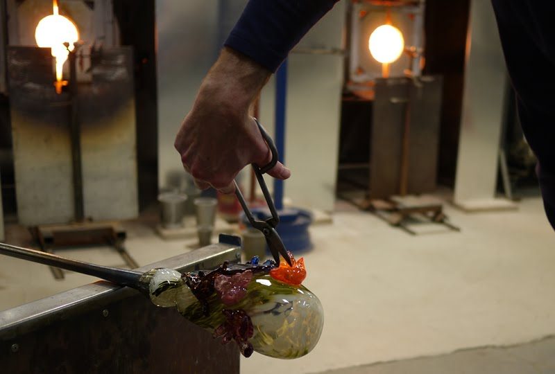 Once you get the ornament on to the vase you can cut and shape it as you please. It happens to be a little scary because when it is hot, the colors are hard to see. Actually, you just have to trust that it is going to turn out.
