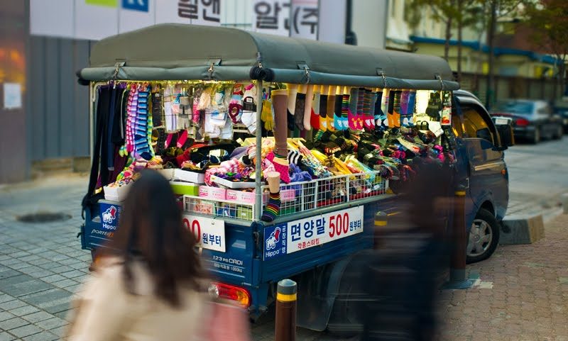 Maybe you need socks? Well they will come to you also...the sign says 500 Won...the equivalent of 40¢ US for a pair. This guy parks next to a new Starbucks...high foot traffic. ;-)