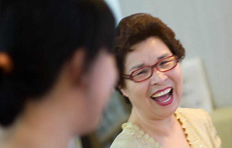Grandma laughing and happy.