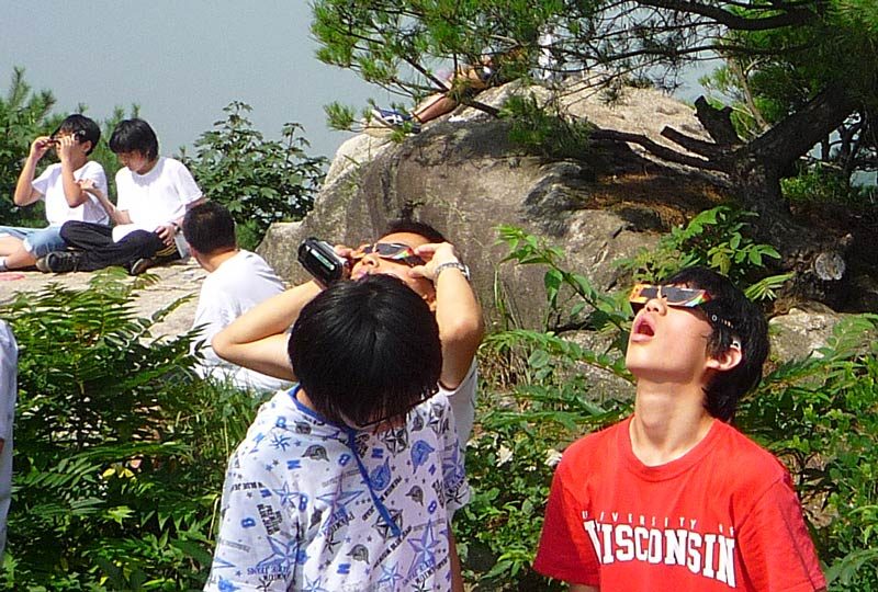 So, when we got up to the top of the mountain we encountered a group of middle school children and their teachers. They had brought special sun glasses so that they could view the eclipse...