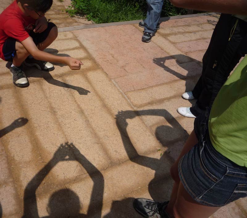 They all tried to see who could make the coolest shadow. Yes...Alex was a show off!